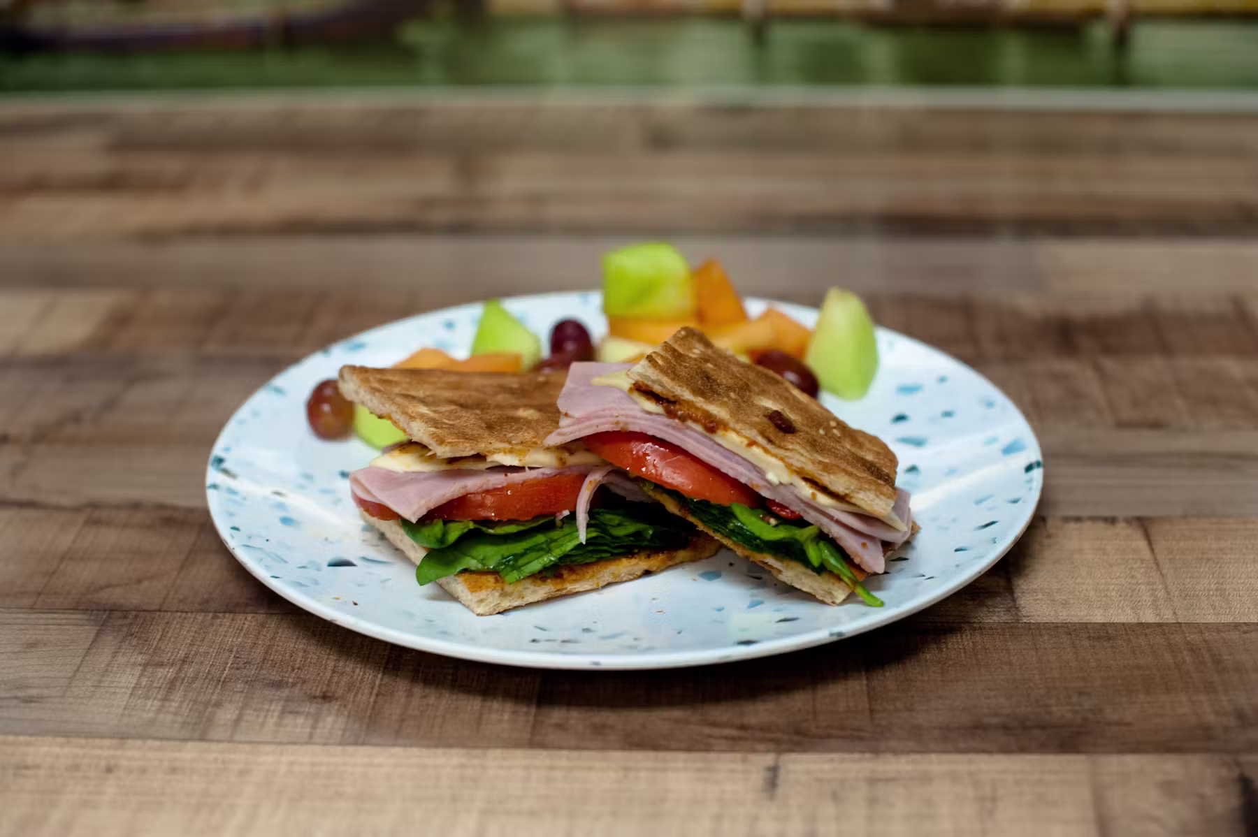 Sandwich and fruit on a plate